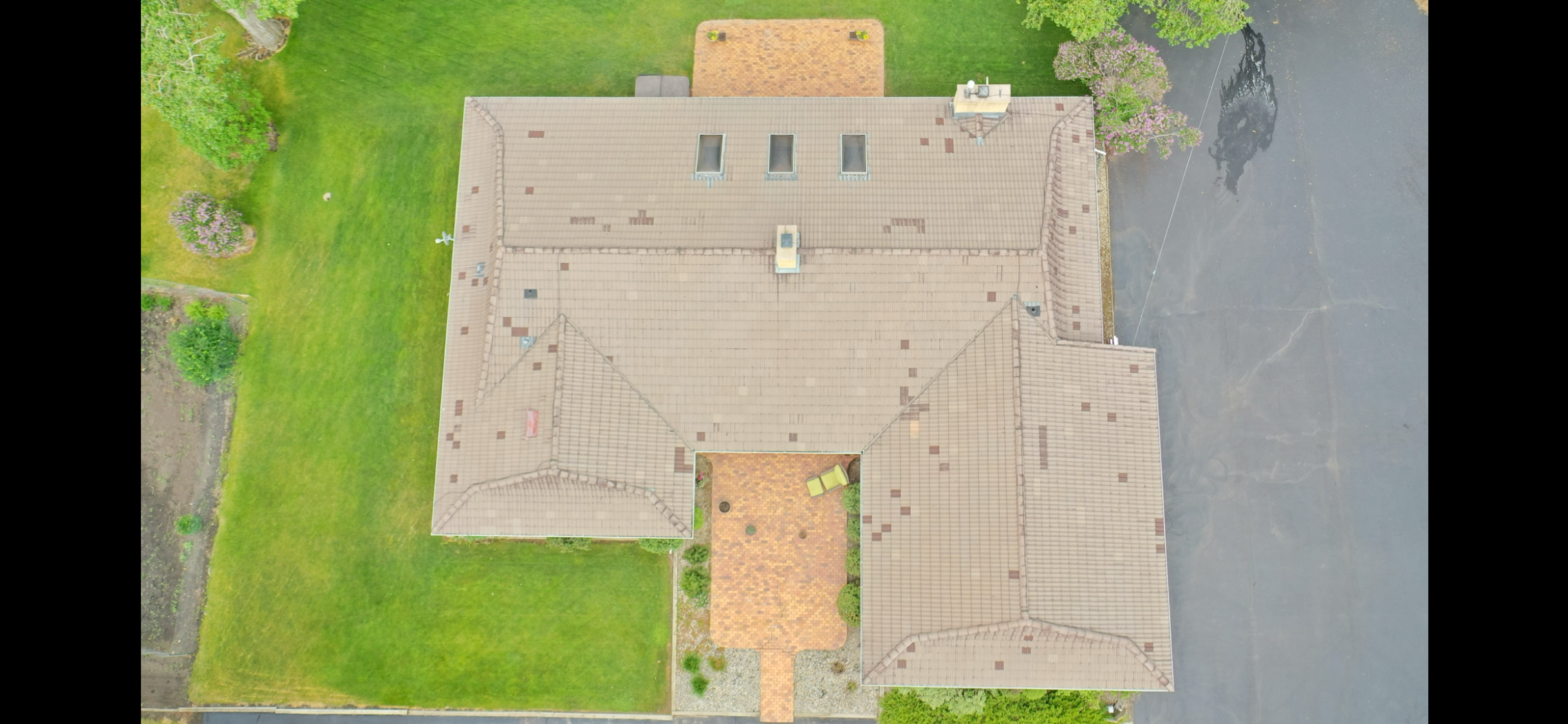 After — GoNano Concrete Tile Roof Cleaning in Olds, AB